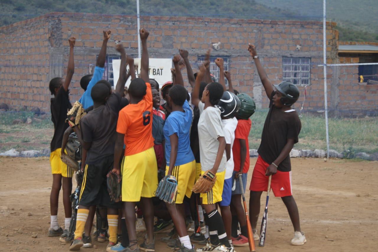 A sports field with athletes training